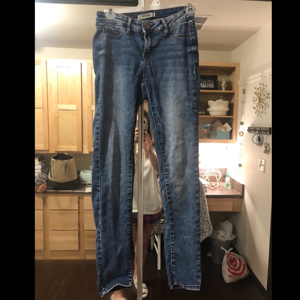 Distressed denim jeans